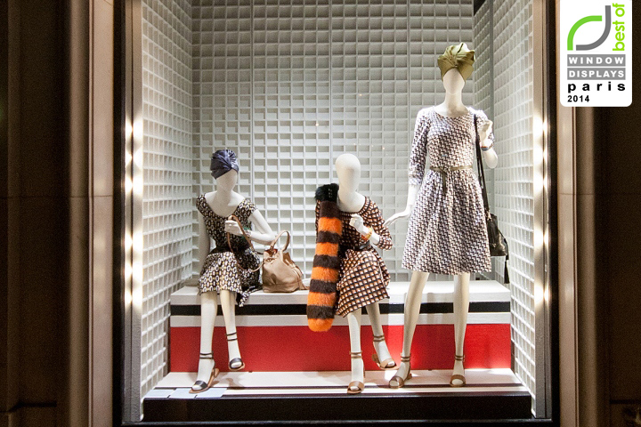 Элегантное и сдержанное оформление витрины бренда prada лето 2014